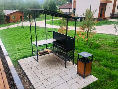 Какие факторы следует учитывать при выборе места для беседки с мангалом для барбекю. Распространенные размеры мангальных зон на участке дома